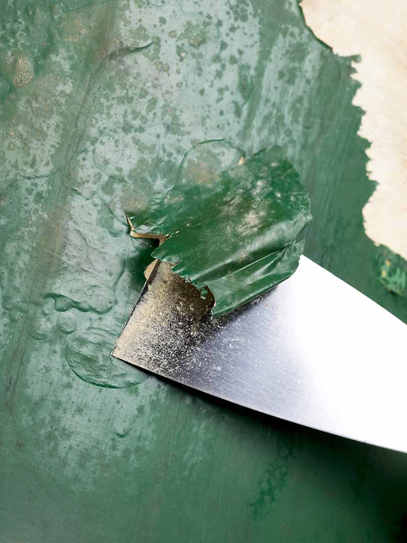 Scraping off commercial paint